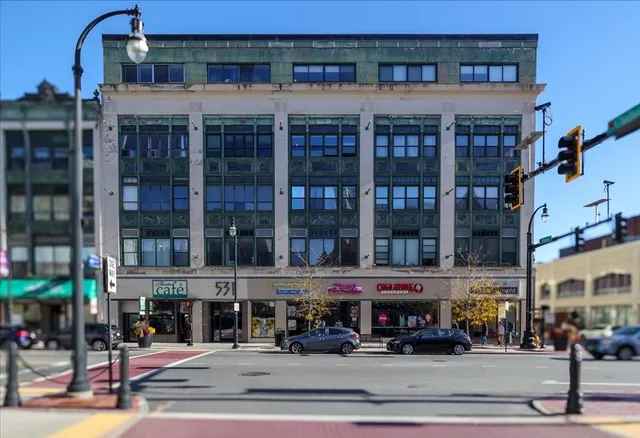 a view of a building and a street