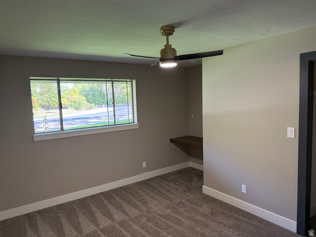 15 West 1600th Street South Mapleton, UT 84664 - Photo 8 of 22 Room featuring light gray walls, white baseboards, and patterned carpet flooring