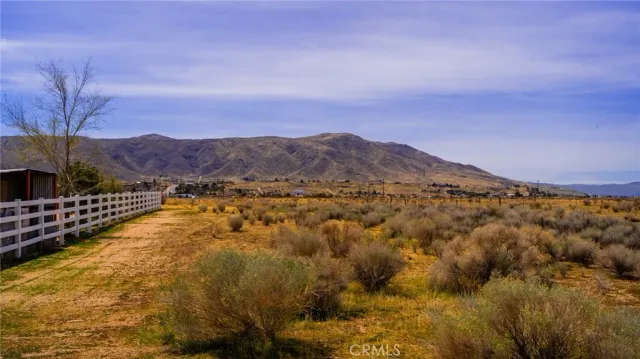 a view of mountains and valleys