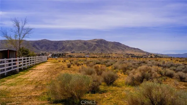 a view of mountains and valleys