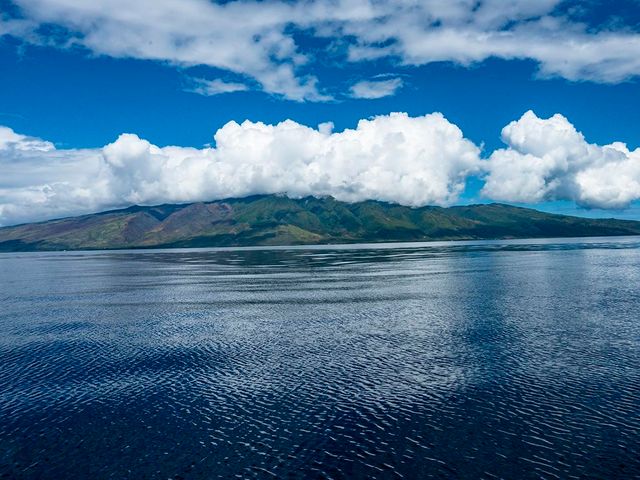 an aerial view of a house with balcony and mountain view