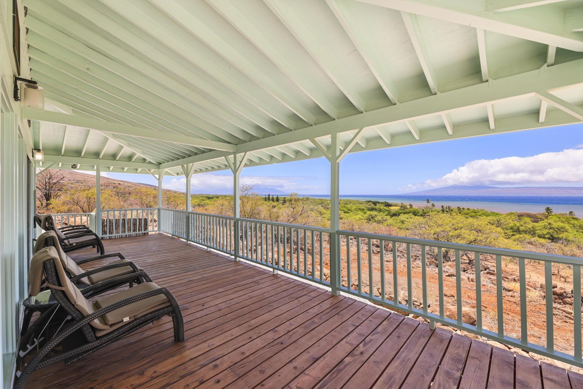 122 Ulua Road Kaunakakai, HI 96748 - Photo 14 of 48 a view of a balcony with wooden floor