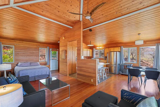 a outdoor space with patio lots of furniture and wooden floor