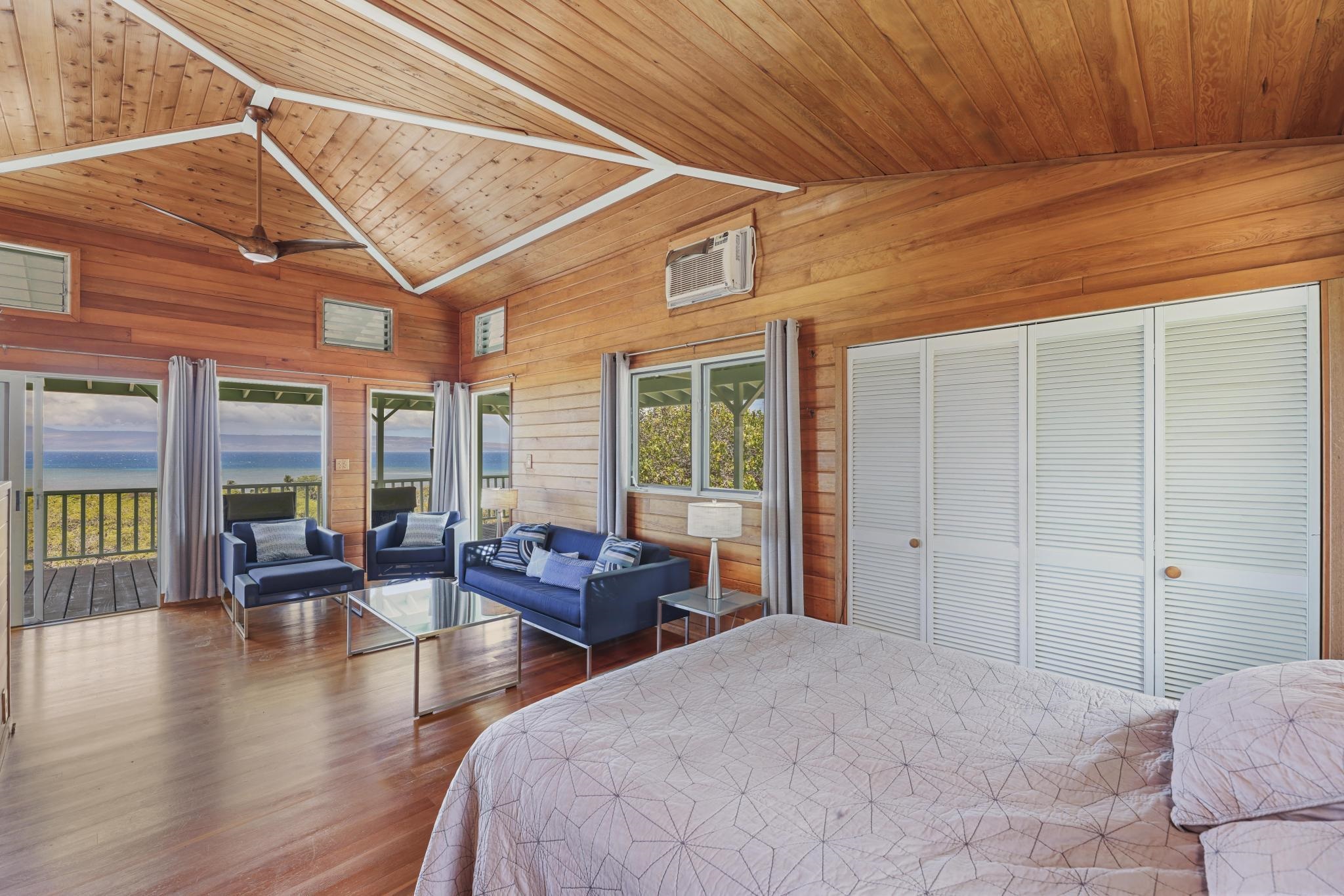 122 Ulua Road Kaunakakai, HI 96748 - Photo 37 of 48 a bedroom with furniture and wooden floor