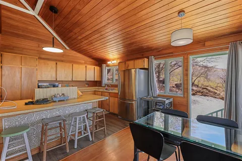 a outdoor space with patio the couches and potted plants with sky view