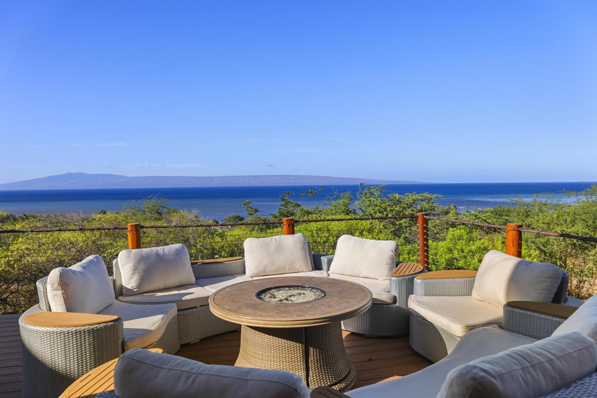 122 Ulua Road Kaunakakai, HI 96748 - Photo 8 of 48 a outdoor living room with furniture and a floor to ceiling window