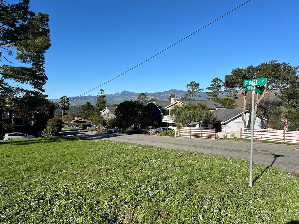 1815 Stuart Street Cambria, CA 93428 - Photo 10 of 14 a view of a street and a building in the background