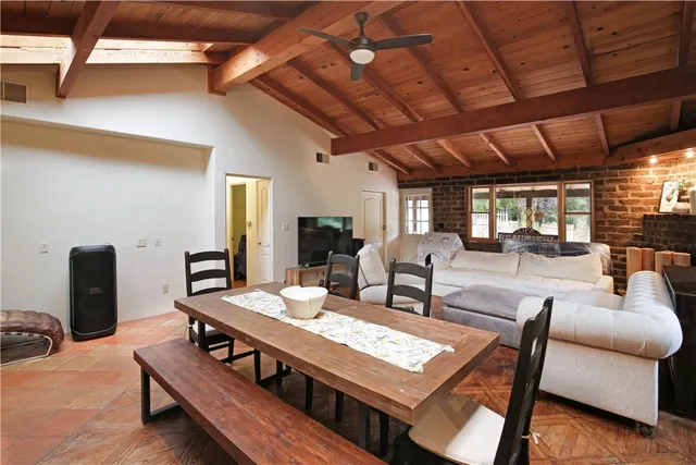 a bedroom with a bed and a mirror