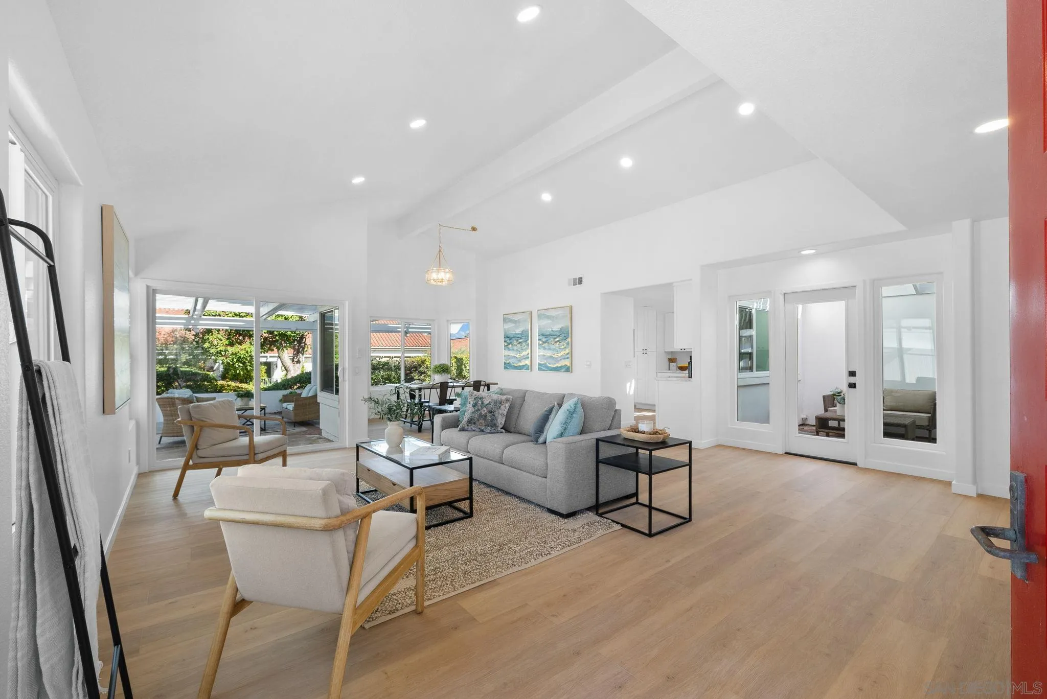4975 Delos Way Oceanside, CA 92056 - Photo 2 of 31 a living room with furniture and a large window