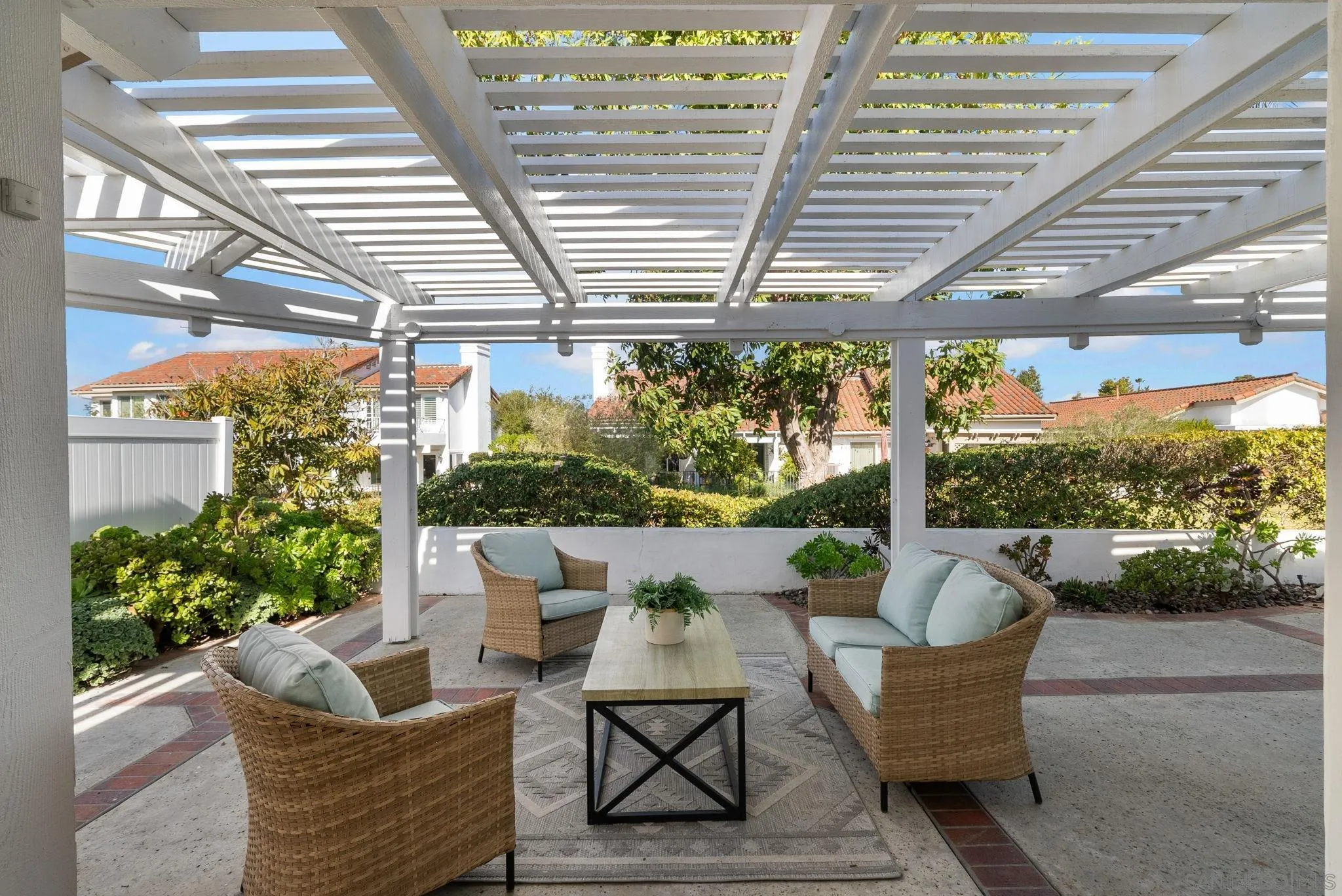4975 Delos Way Oceanside, CA 92056 - Photo 23 of 31 a outdoor living space with furniture and garden view