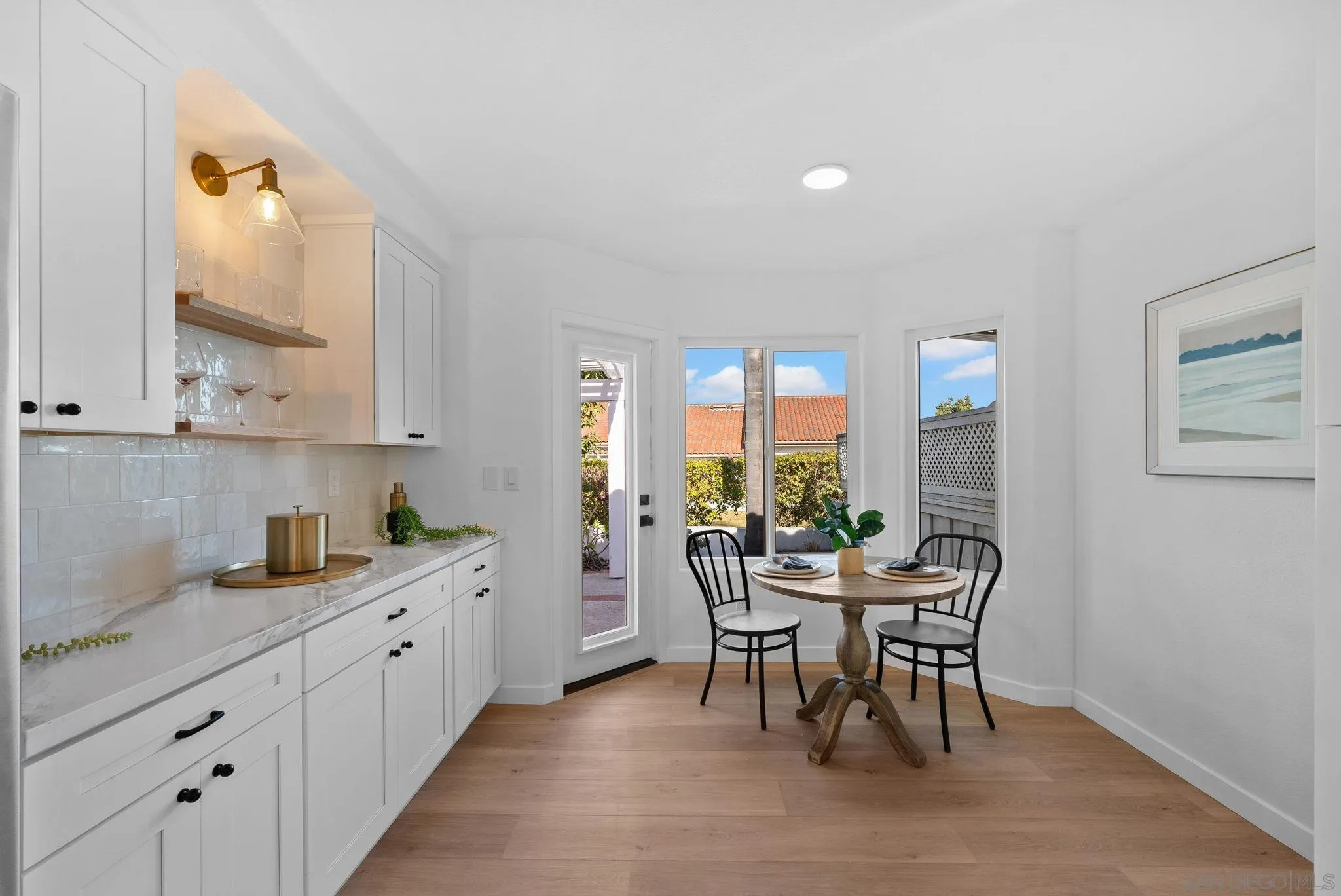 4975 Delos Way Oceanside, CA 92056 - Photo 10 of 31 a view of a dining room with furniture window and outside view
