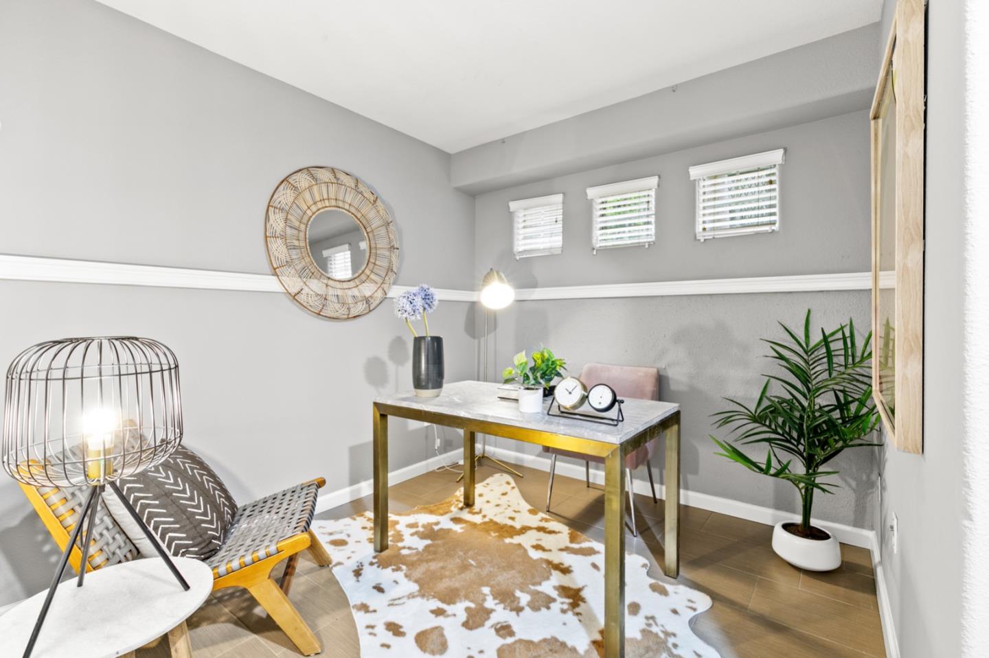 66 Parc Pl Drive Milpitas, CA 95035 - Photo 12 of 34 a living room with furniture and a potted plant