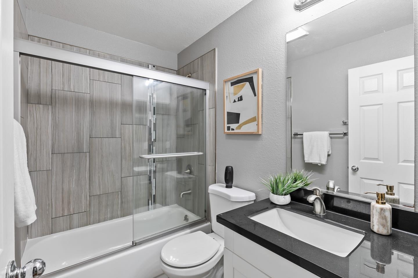 66 Parc Pl Drive Milpitas, CA 95035 - Photo 13 of 34 a bathroom with a sink toilet and shower