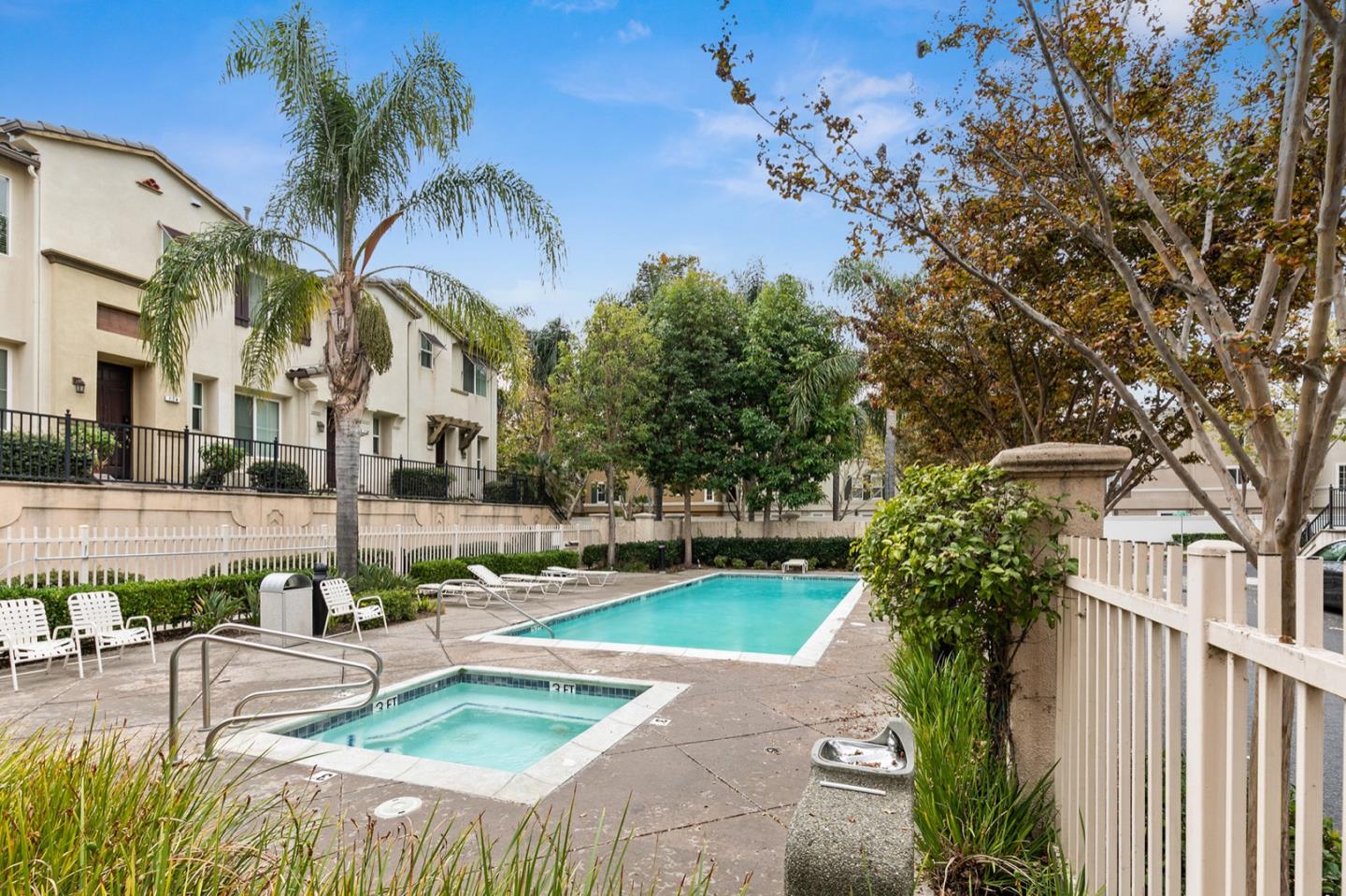 66 Parc Pl Drive Milpitas, CA 95035 - Photo 30 of 34 a view of a swimming pool with a patio