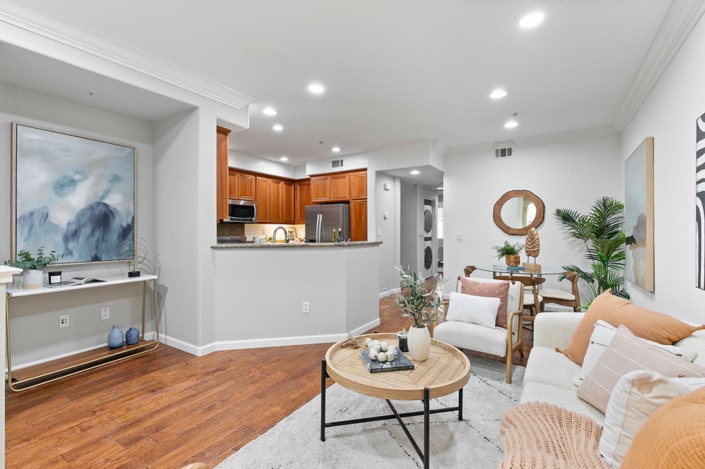 66 Parc Pl Drive Milpitas, CA 95035 - Photo 3 of 34 a living room with furniture and a wooden floor