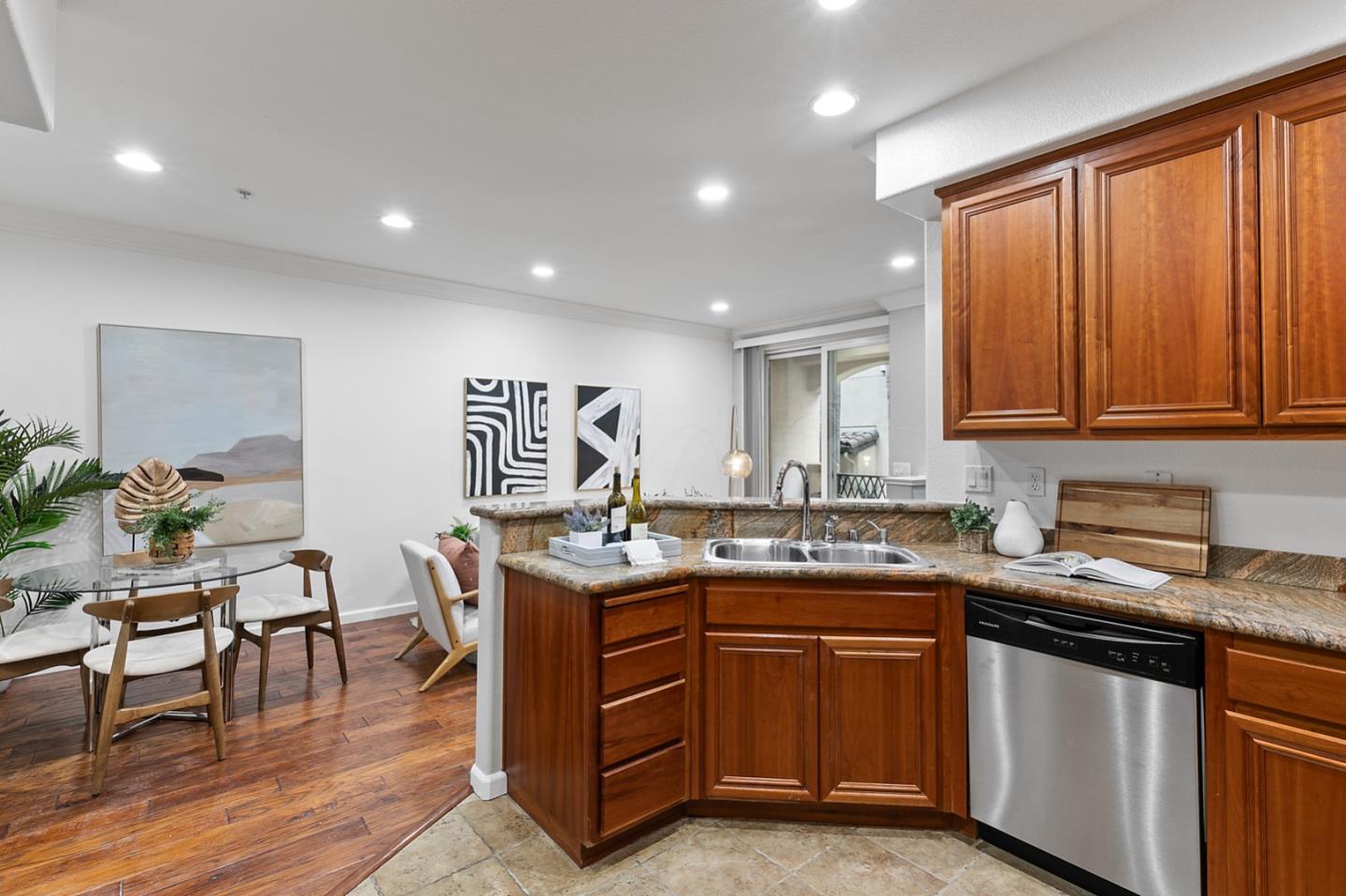 66 Parc Pl Drive Milpitas, CA 95035 - Photo 8 of 34 a kitchen with a sink stove and cabinets