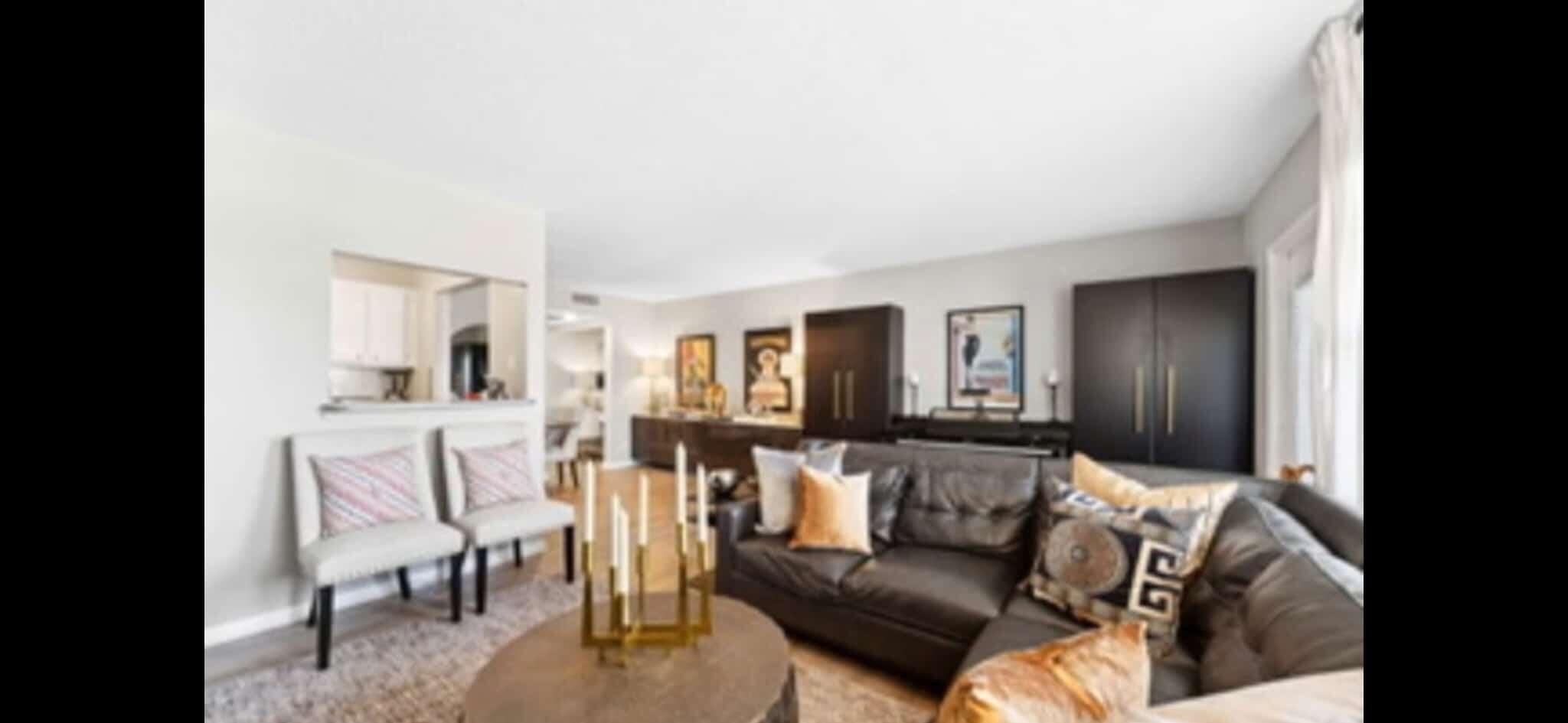 321 Dorset Drive Boca Raton, FL 33434 - Photo 1 of 6 a living room with furniture and painting on the wall