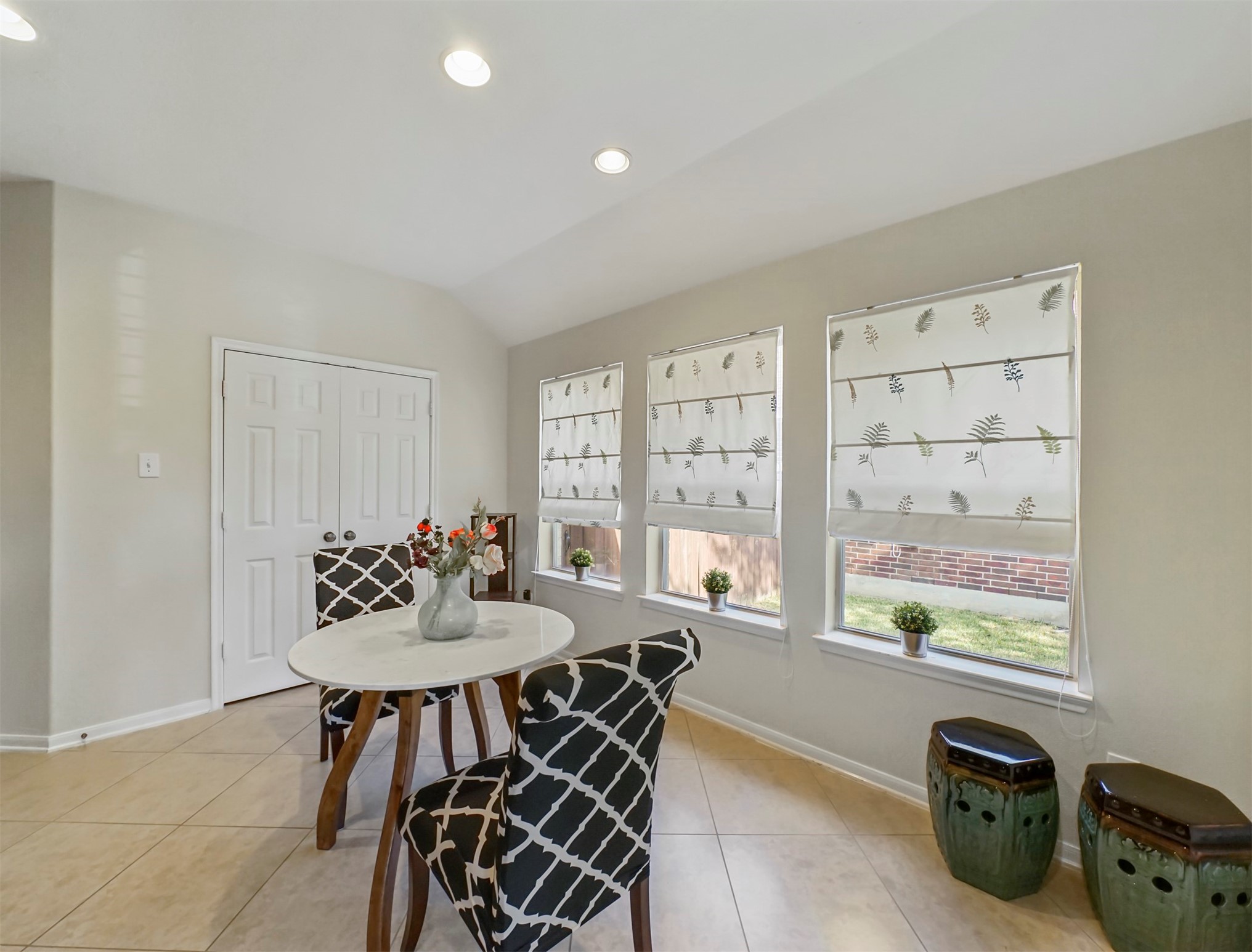 8214 Garrison Point Drive Houston, TX 77040 - Photo 4 of 37 a view of a dining room with furniture and a window