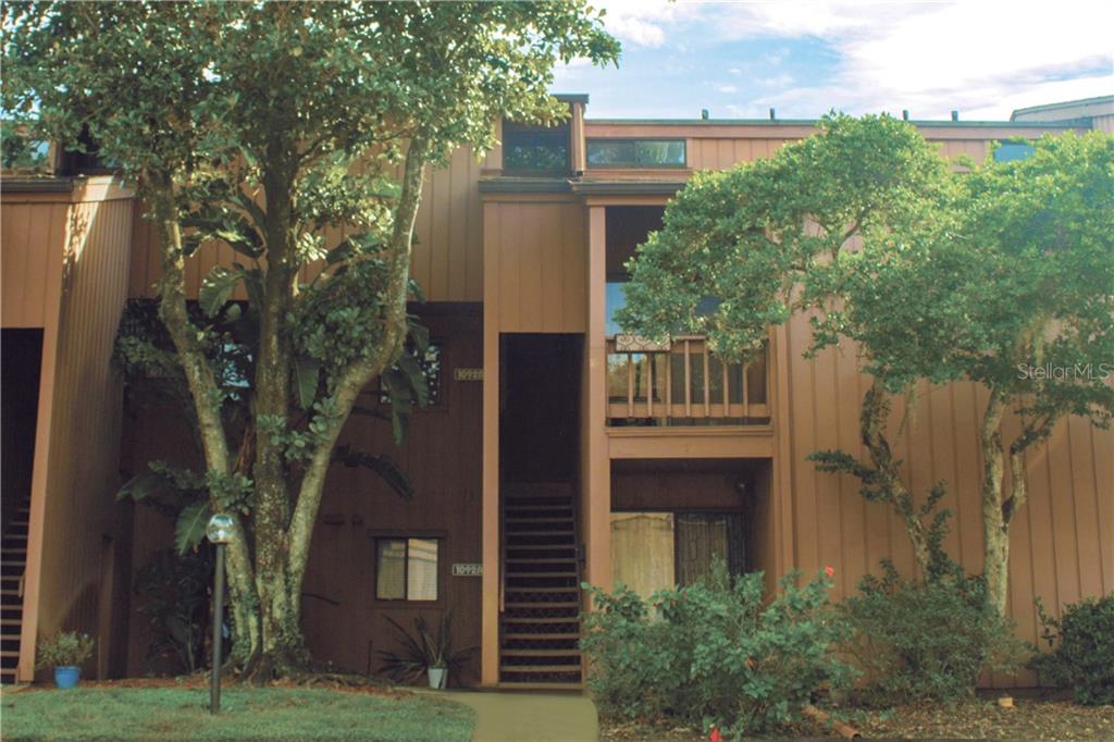1092 East Michigan Street, Unit A Orlando, FL 32806 - Photo 1 of 1 a view of a house with a tree