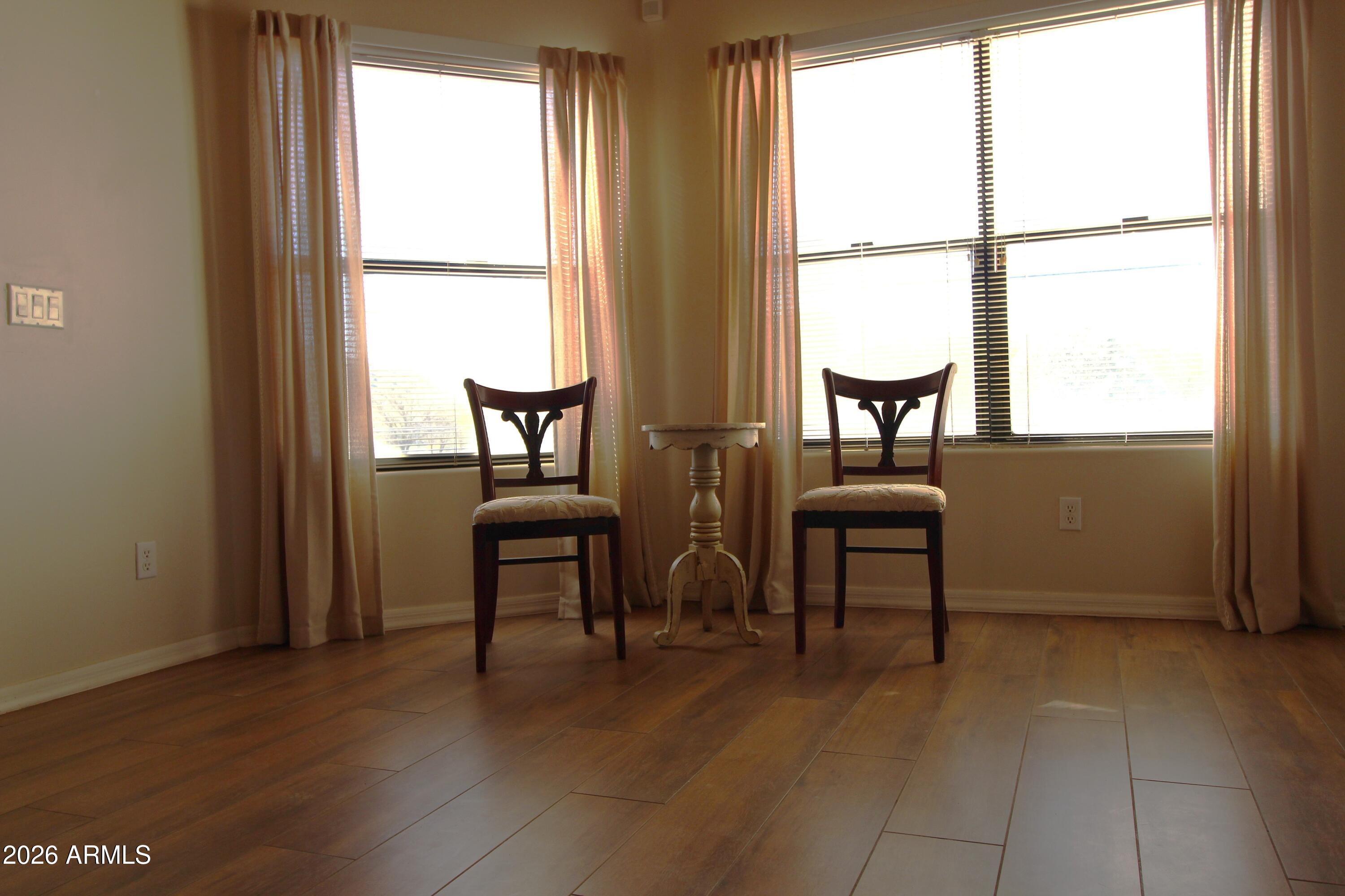 1405 East Circle Mountain Road New River, AZ 85087 - Photo 15 of 40 a view of a livingroom with furniture and window