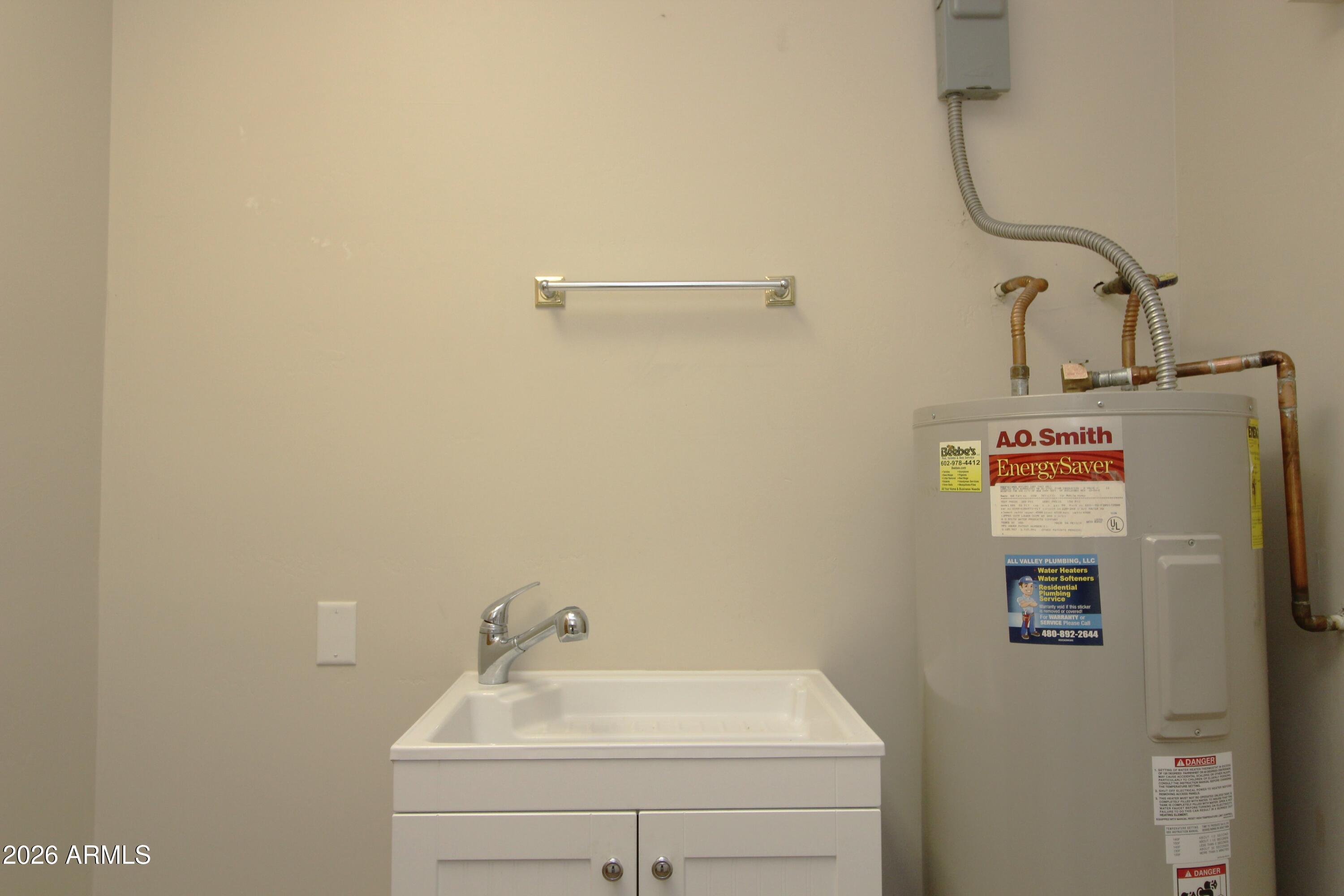 1405 East Circle Mountain Road New River, AZ 85087 - Photo 29 of 40 a bathroom with a sink and mirror