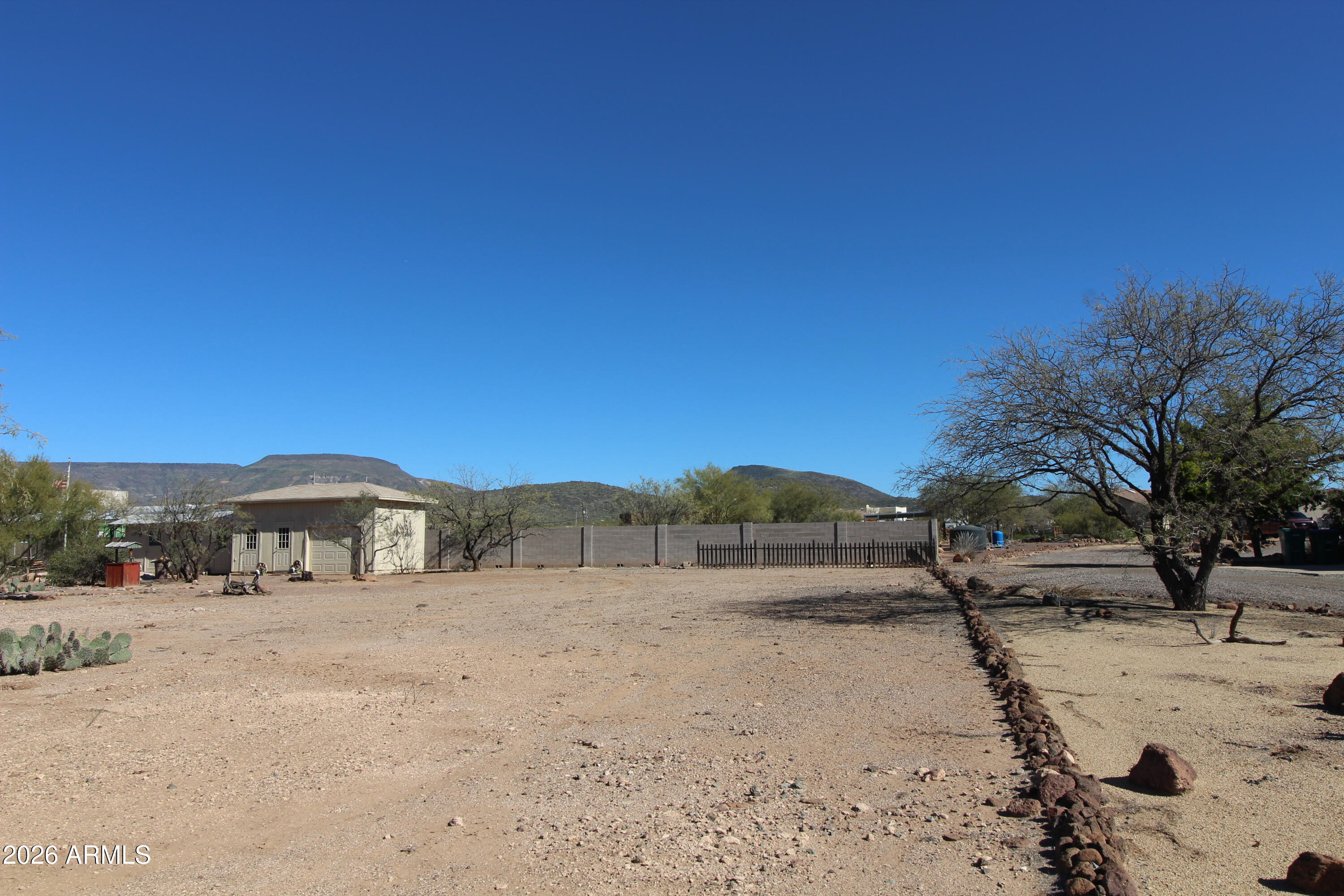 1405 East Circle Mountain Road New River, AZ 85087 - Photo 31 of 40 a front view of a house with a yard