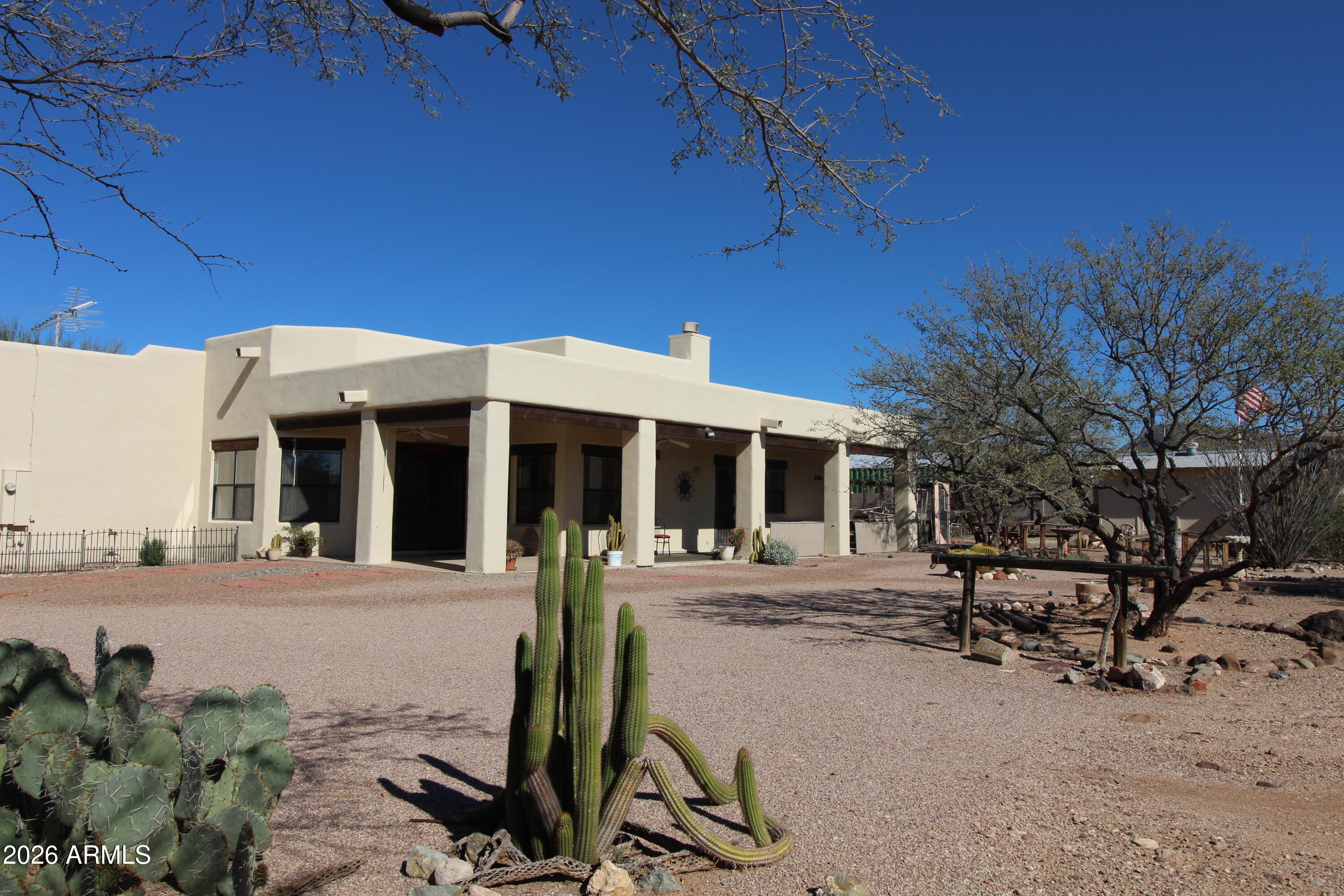 1405 East Circle Mountain Road New River, AZ 85087 - Photo 32 of 40 a front view of a house with a yard