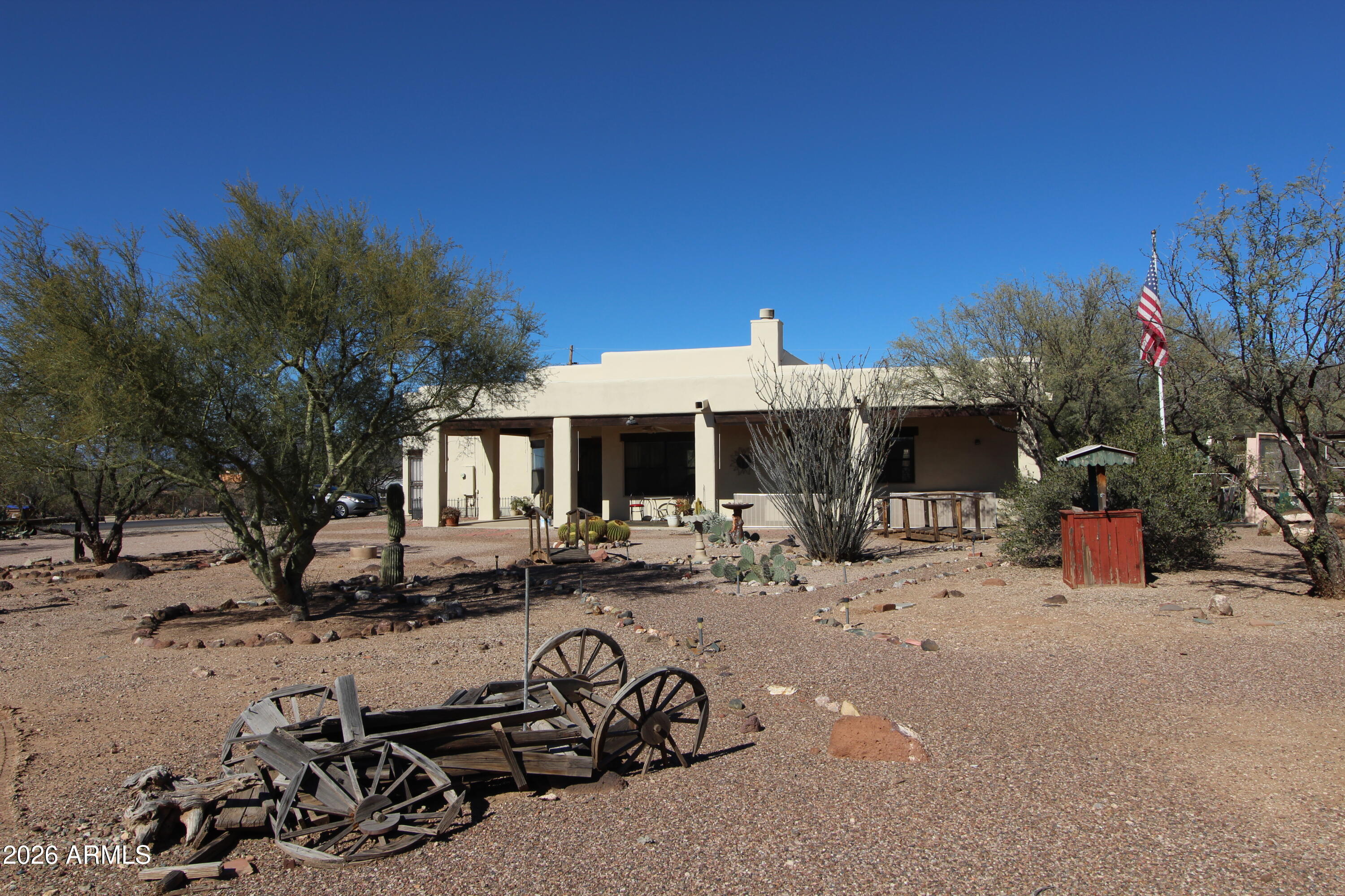 1405 East Circle Mountain Road New River, AZ 85087 - Photo 33 of 40 a view of a yard with a patio