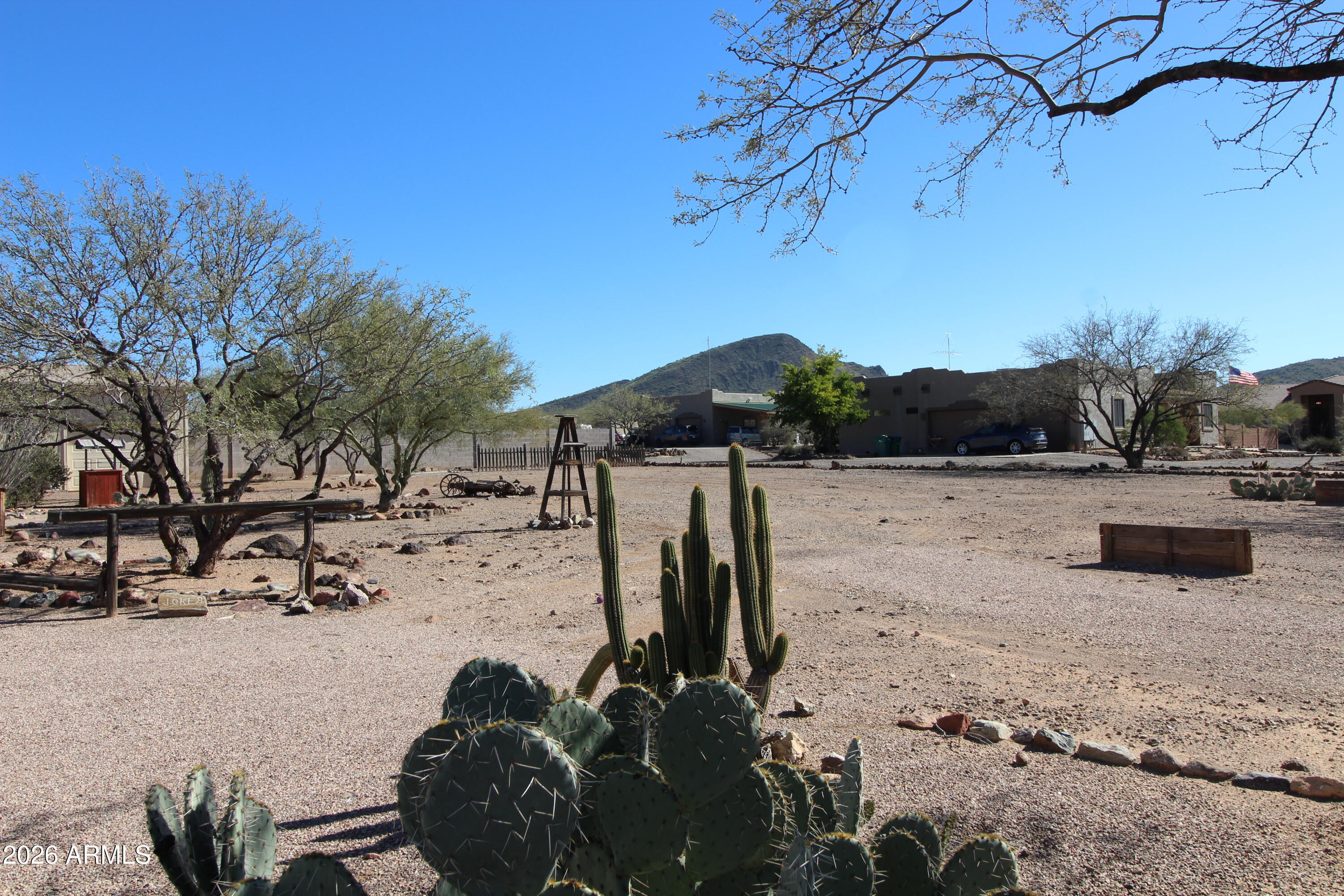 1405 East Circle Mountain Road New River, AZ 85087 - Photo 35 of 40 a view of a lake with a mountain