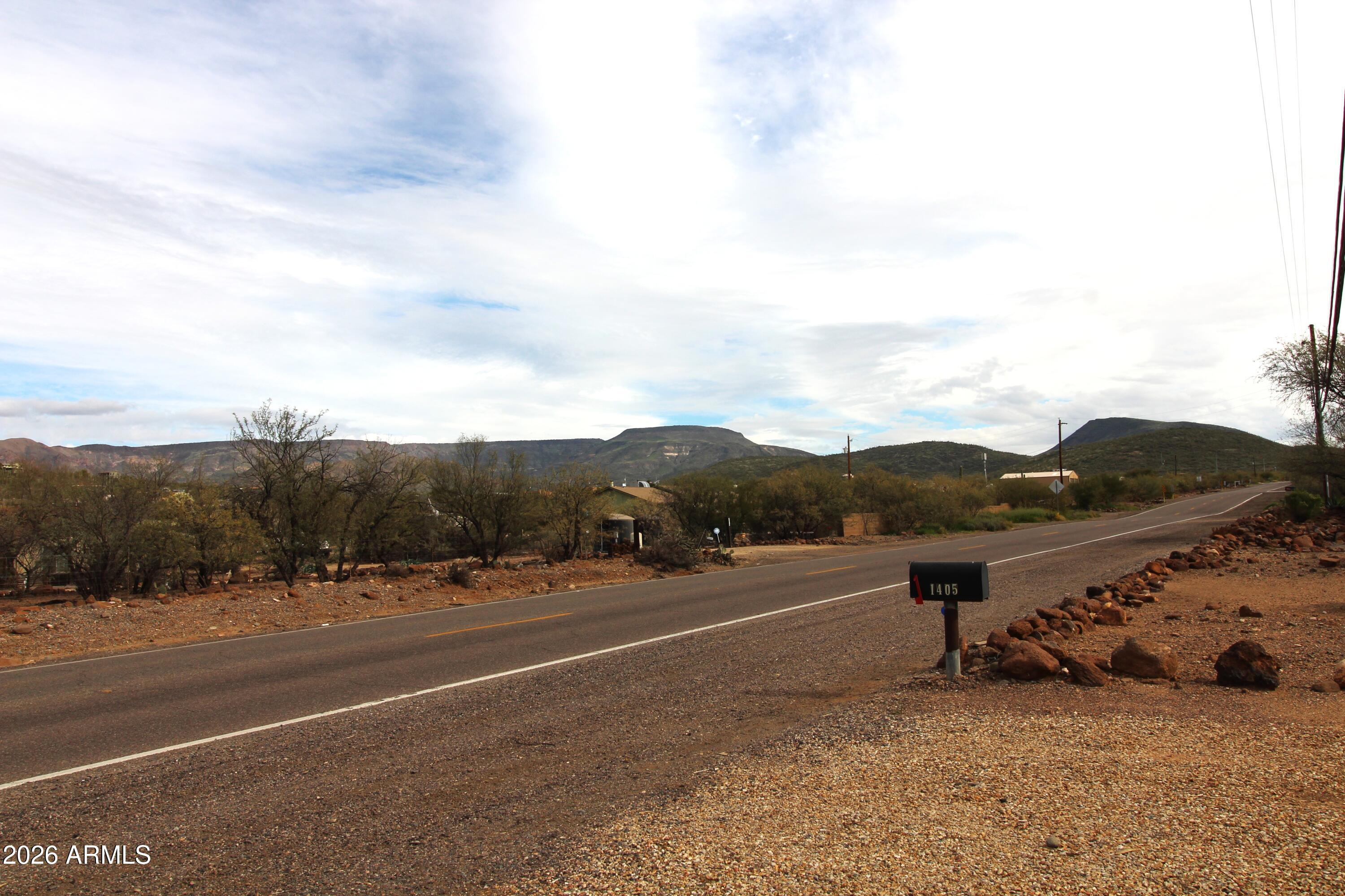 1405 East Circle Mountain Road New River, AZ 85087 - Photo 40 of 40 a view of road with yard and mountain view in back