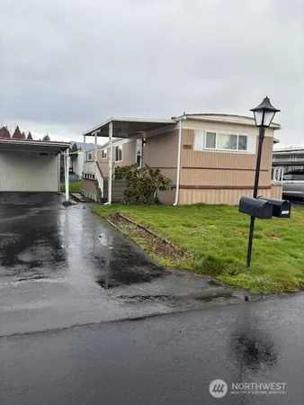 a house view with a garden space
