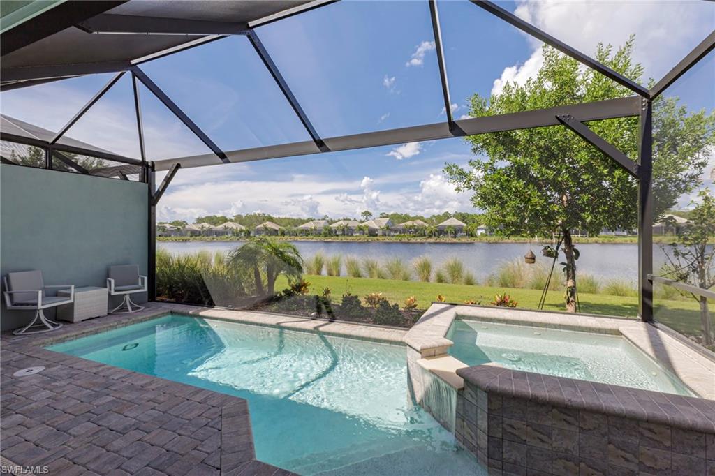 a view of a swimming pool with a patio