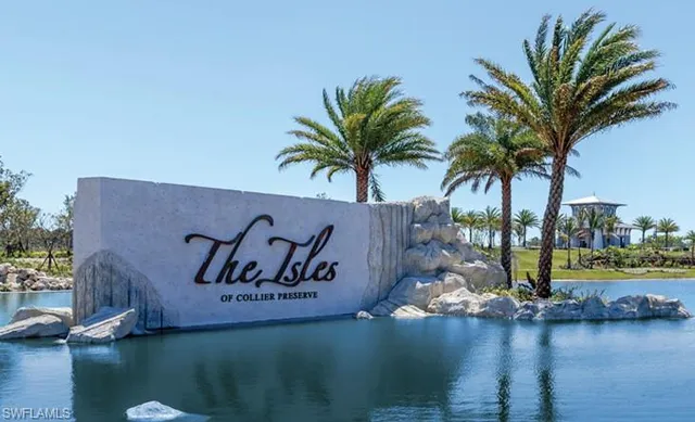 a view of swimming pool with a yard and palm trees