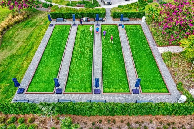 a view of yard and swimming pool and outdoor seating