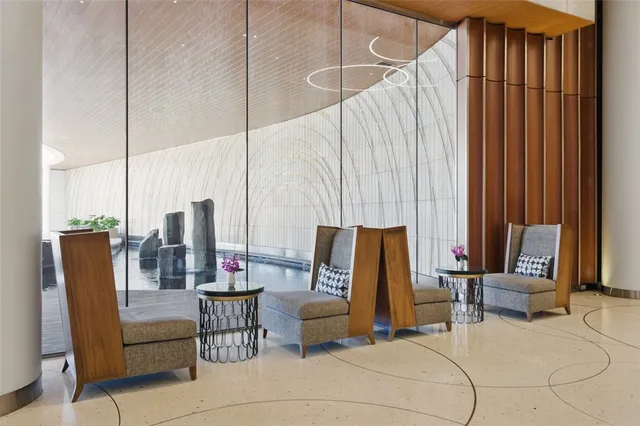 a living room with furniture and a bathtub