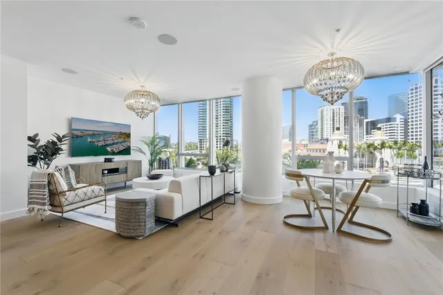 a view of a livingroom with furniture and a chandelier