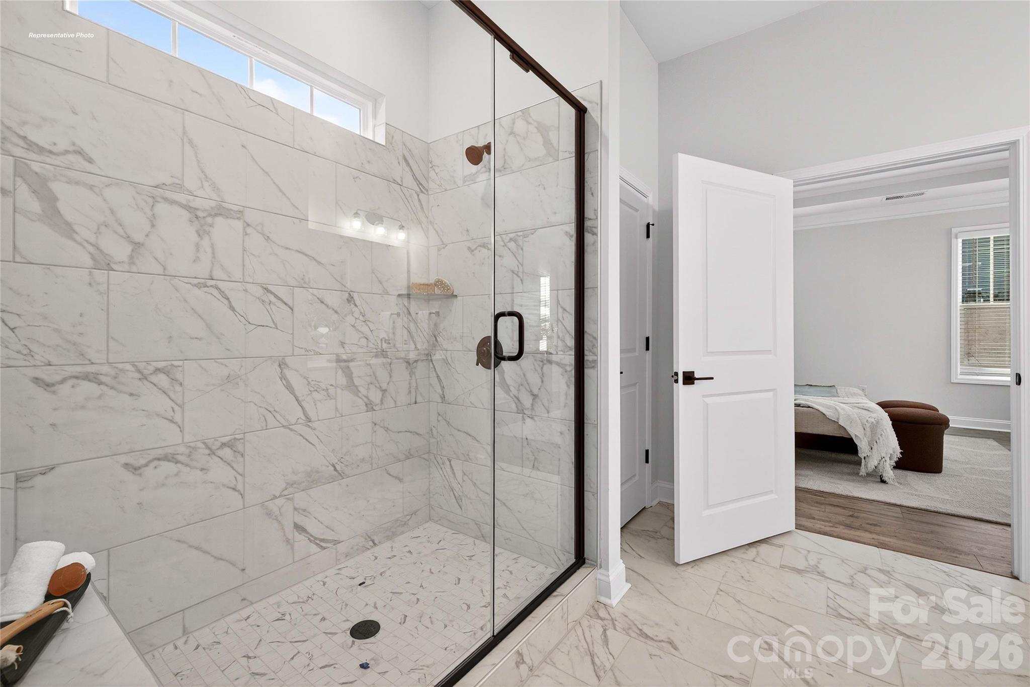 111 Rhuidean Court Troutman, NC 28166 - Photo 19 of 28 a bathroom with a shower