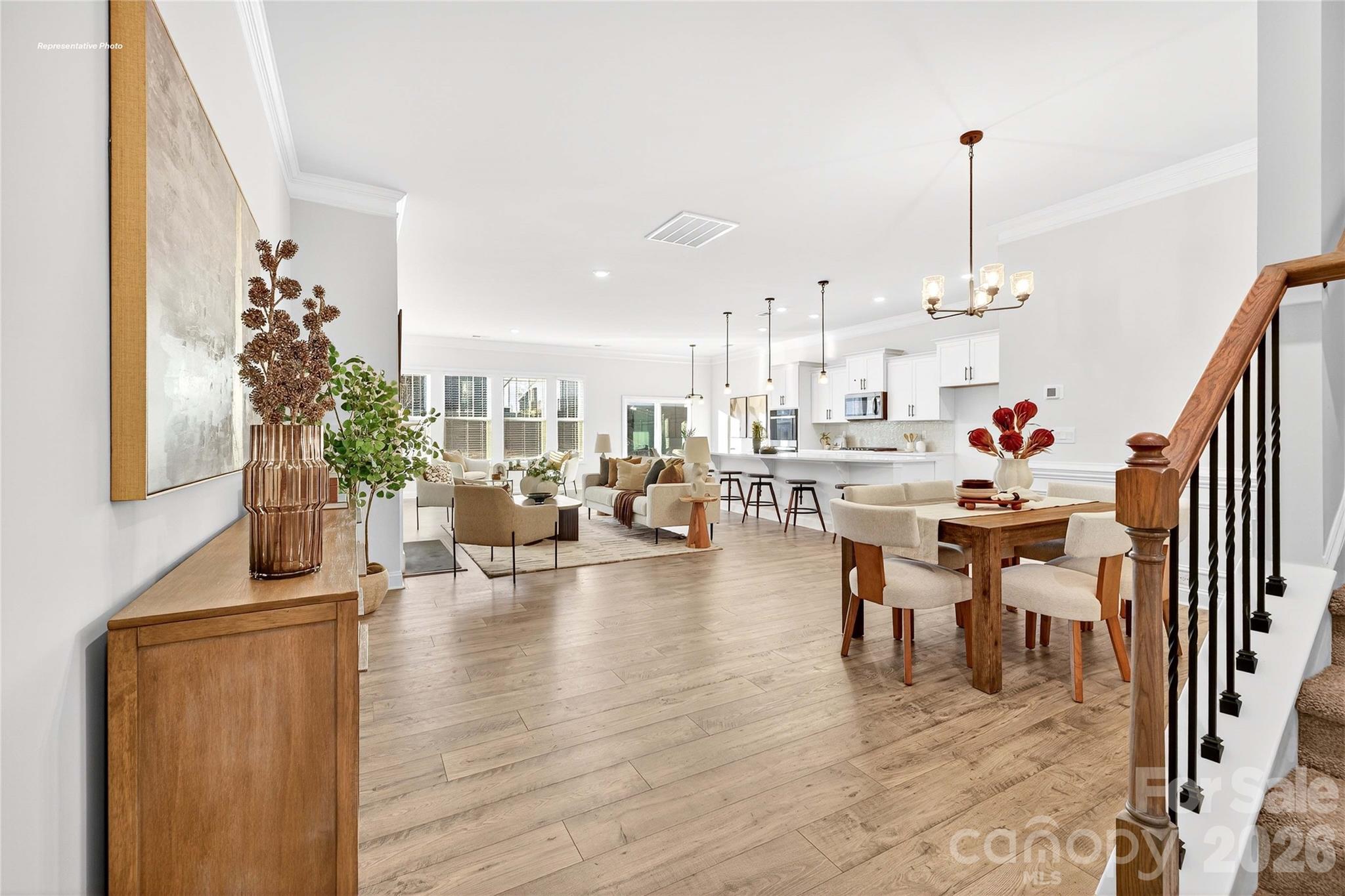 111 Rhuidean Court Troutman, NC 28166 - Photo 2 of 28 a living room with furniture and a wooden floor