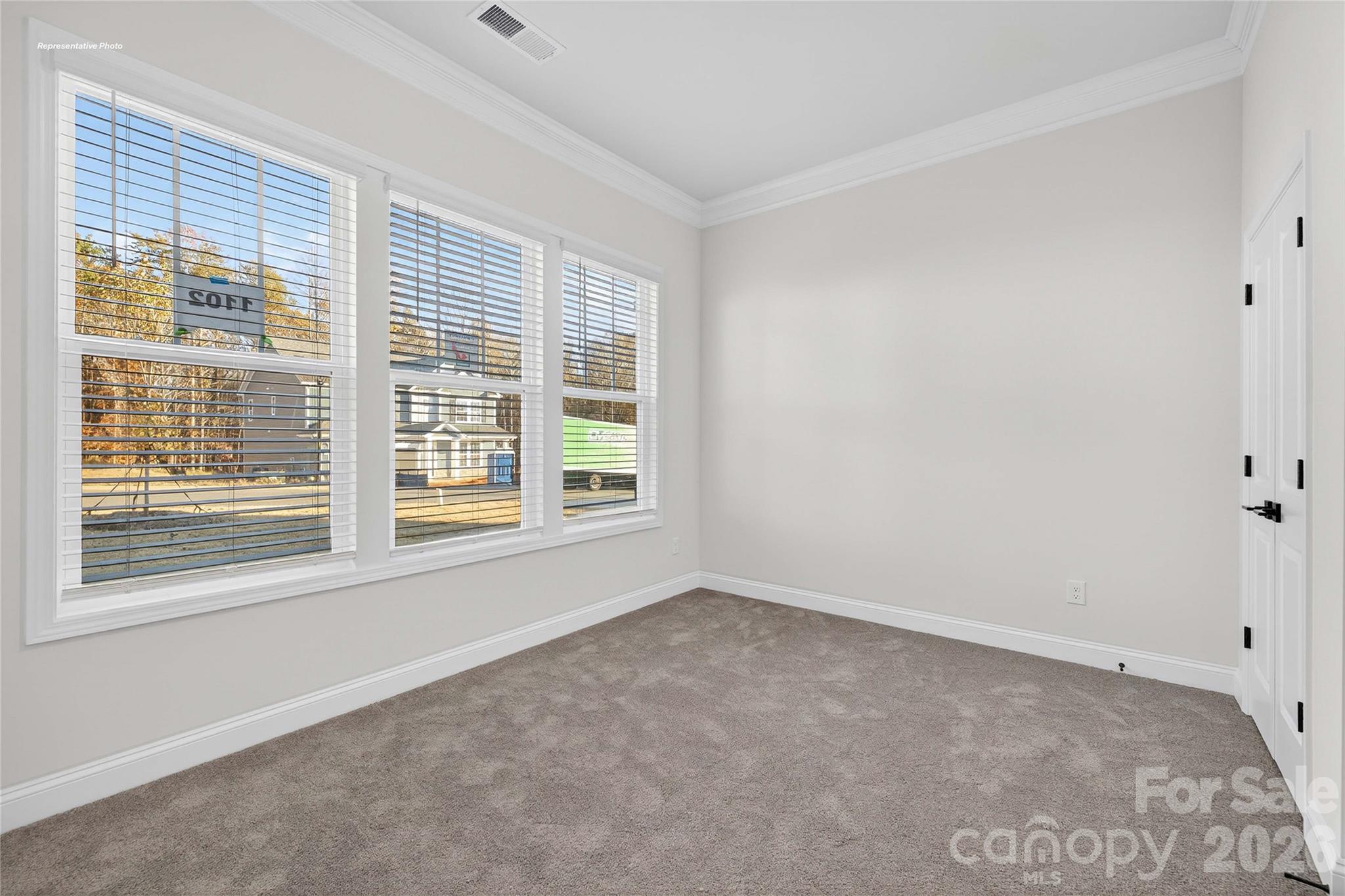 111 Rhuidean Court Troutman, NC 28166 - Photo 22 of 28 a view of an empty room with a window