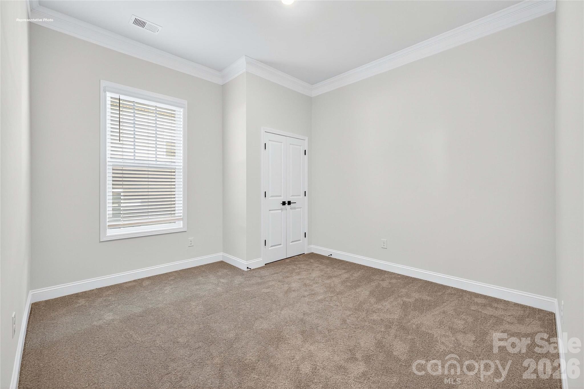 111 Rhuidean Court Troutman, NC 28166 - Photo 23 of 28 a view of an empty room with a window