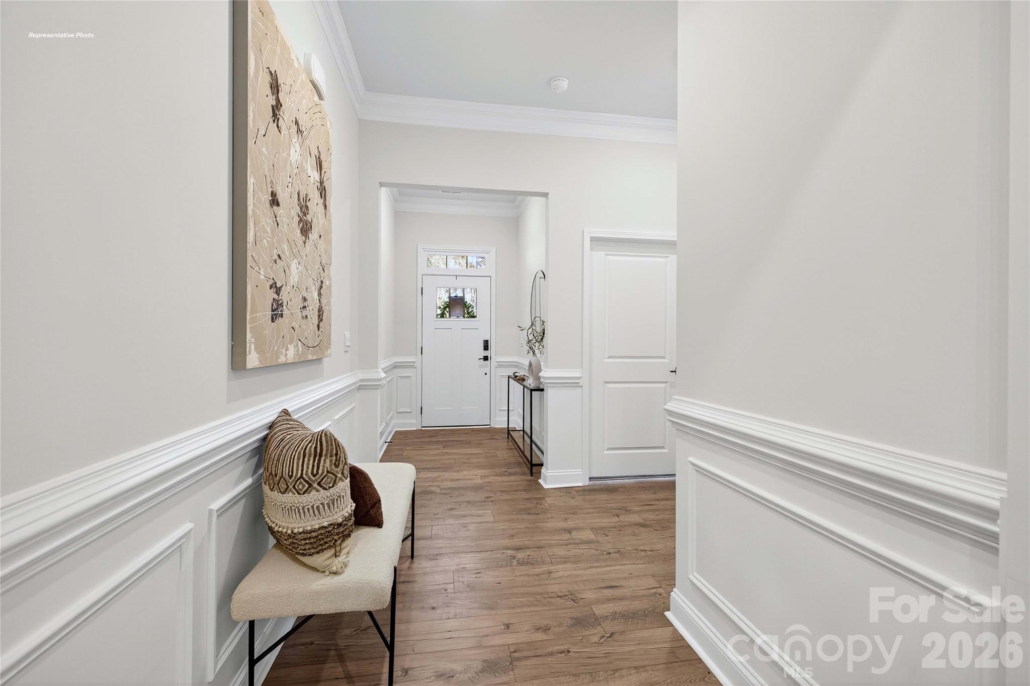 111 Rhuidean Court Troutman, NC 28166 - Photo 24 of 28 a living room with furniture and a wooden floor