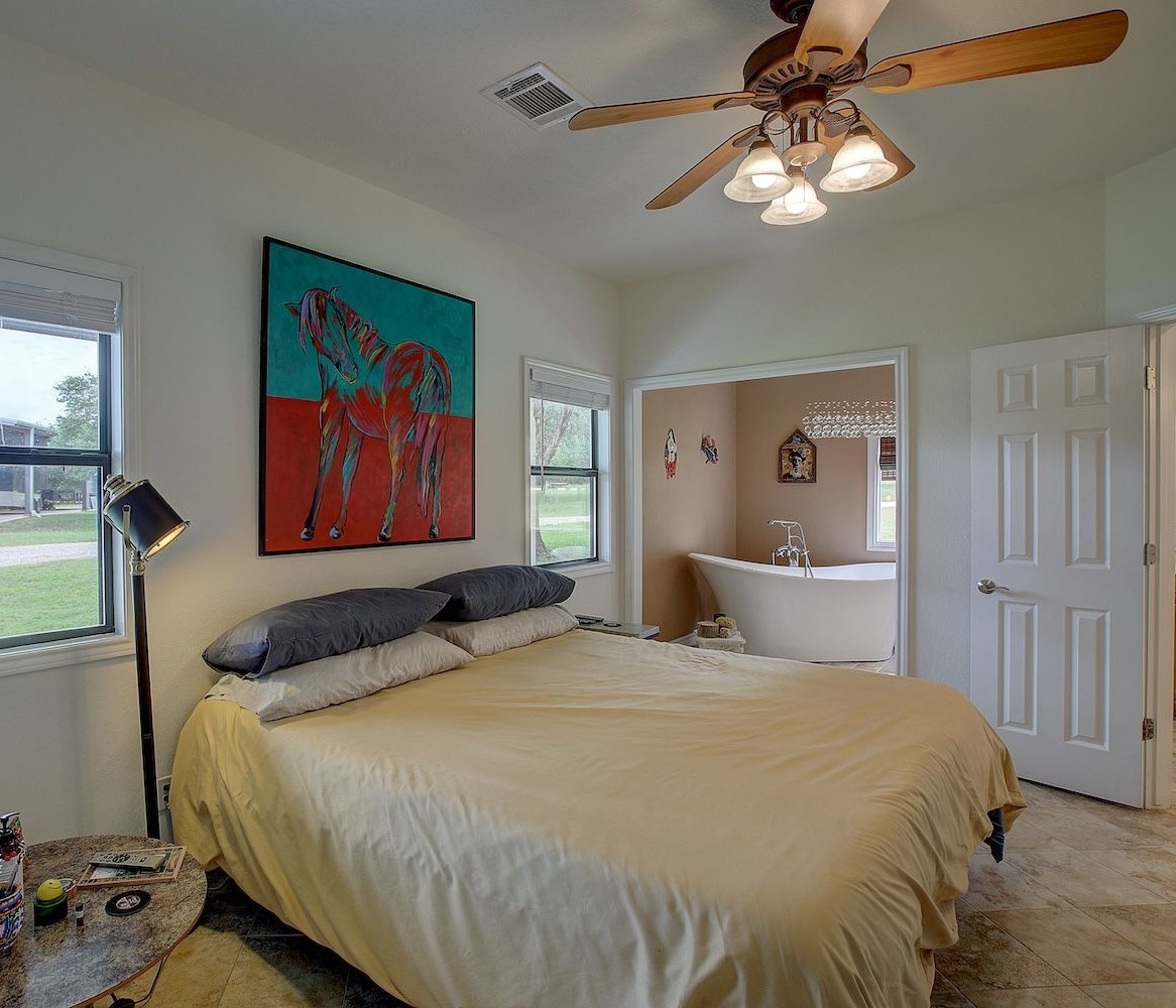 1928 Koether Road Carmine, TX 78932 - Photo 19 of 49 Primary bedroom with a large Primary bath to accommodate all of your needs for relaxation and comfort