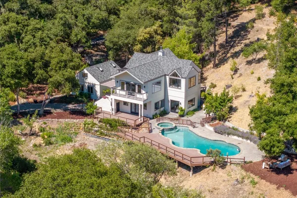 an aerial view of a house with garden