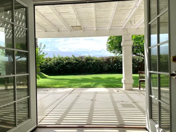 a view of porch with a yard
