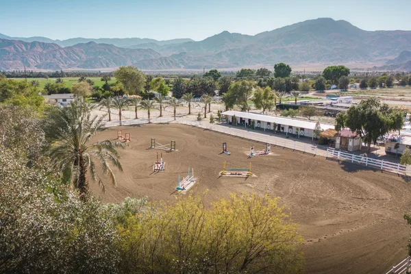 a view of a street with a mountain
