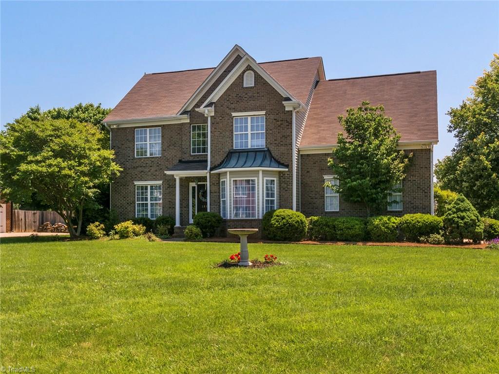 2806 Norwell Court Oak Ridge, NC 27310 - Photo 1 of 30 Wow! Beautiful brick front exterior and tasteful landscaping in flat front yard. Home also offers a large fenced backyard and side facing garage.