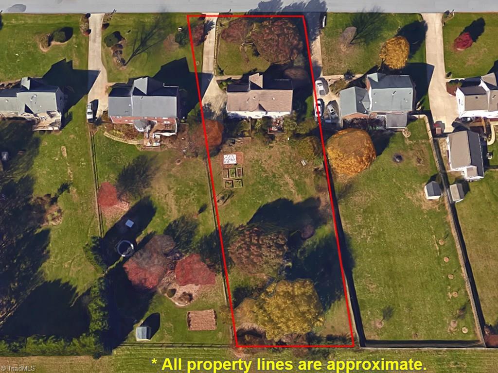 2806 Norwell Court Oak Ridge, NC 27310 - Photo 2 of 30 Large fenced backyard and no neighbor behind you