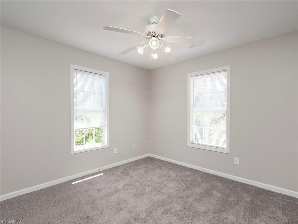 2806 Norwell Court Oak Ridge, NC 27310 - Photo 18 of 30 Bright Office with Ceiling fan! Could also be game room or Exercise room
