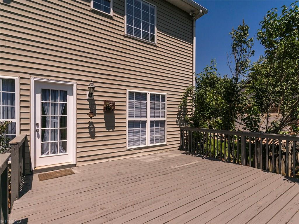 2806 Norwell Court Oak Ridge, NC 27310 - Photo 20 of 30 Grill out on the oversized deck that walks down onto patio area!