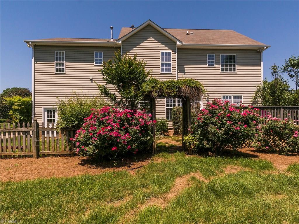 2806 Norwell Court Oak Ridge, NC 27310 - Photo 24 of 30 Extra patio area with Charming Arbor!